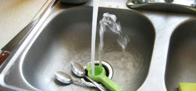 A kitchen sink with water treated using reverse osmosis in Austin