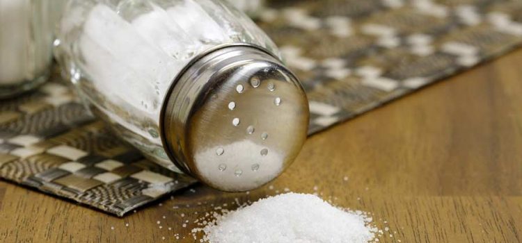 Salt shaker knocked over and spilling onto a table at an Austin, Tx water treatment facility