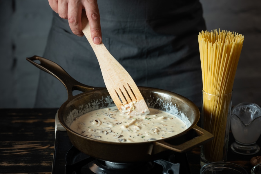 chef cooking a delicious sauce based on clean and purified water