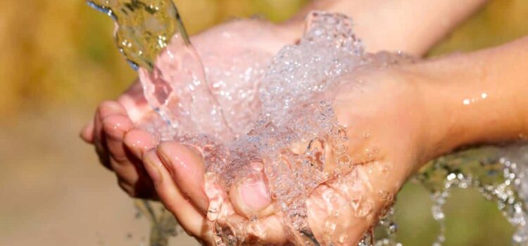 hands with a splash of water