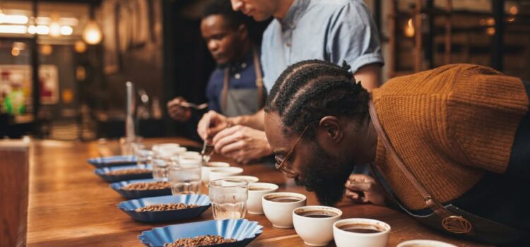 Group of baristas tasting different type of coffee made with filtered water