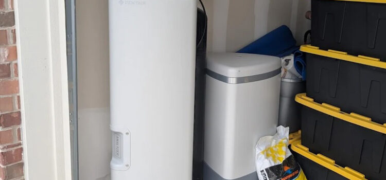 Water softener system in a Texas home garage providing clean, softened water for San Antonio, Austin, and Houston homeowners